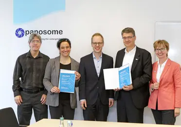 KMU German federal grant award to DKFZ and spinoff Panosome GmbH (over 4.5M EURO). Images shows Drs. Stebbins and Papavasiliou with Dr. Baumann and Ursula Weyrich of DKFZ with the Parliamentary State Secretary at the BMBF, Dr. Jens Brandenburg.