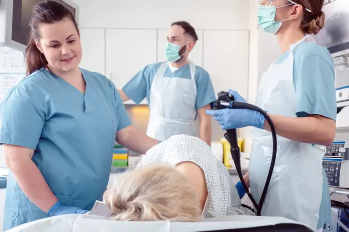 Patient and doctor in hospital during colonoscopy